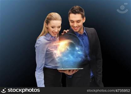 business, future technology and people concept - businessman and businesswoman with tablet pc computer and planet hologram over dark blue background. businesspeople with tablet pc and planet hologram. businesspeople with tablet pc and planet hologram