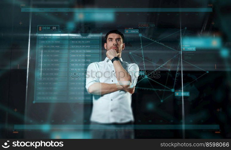 business, future technology and people concept - businessman looking at projection on virtual screen at night office. businessman at virtual screen at night office