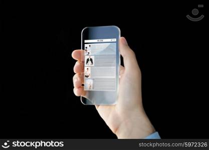 business, future technology, internet and people concept - close up of male hand holding and showing transparent smartphone with web site page on screen over black background