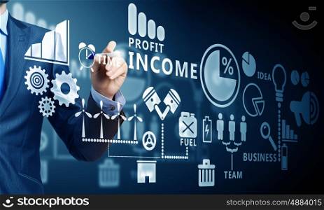 Business futuristic concept. Close up of businessman drawing strategy plan on media screen
