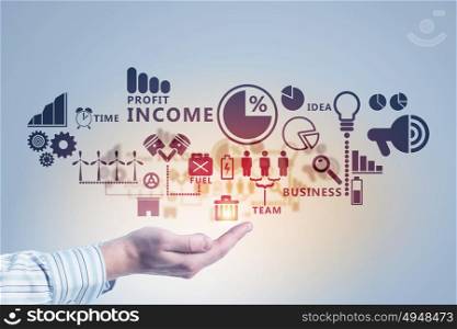 Business futuristic concept. Close up of businessman hand presenting in palm digital business strategy