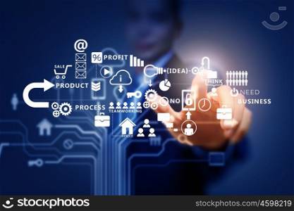 Business futuristic concept. Close up of businessman touching icon of media screen
