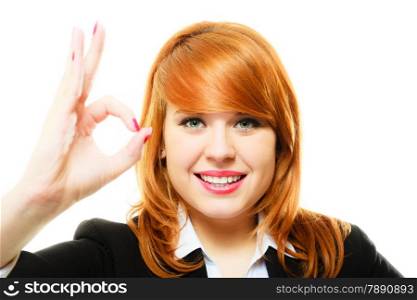 Business, gesture and office concept. Attractive redhair smiling businesswoman or student girl showing gesturing ok sign. Isolated on white background