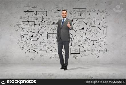 business, gesture and office concept - handsome businessman showing thumbs up with big plan on the back