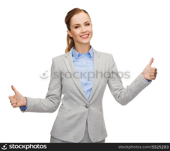 business, gesture and office concept - smiling businesswoman showing thumbs up