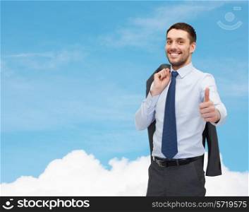 business, gesture and people concept - smiling young and handsome businessman showing thumbs up over blue sky with white cloud background