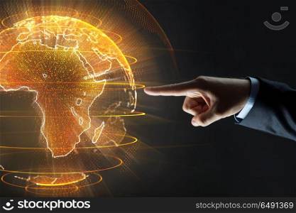 business, globalization and future technology concept - close up of businessman hand with earth hologram over black. close up of businessman hand with earth hologram. close up of businessman hand with earth hologram