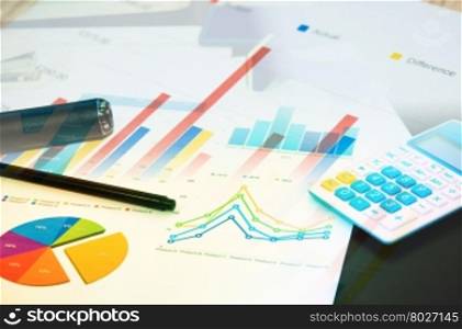 Business graph of financial analytics and pen.Business Concept