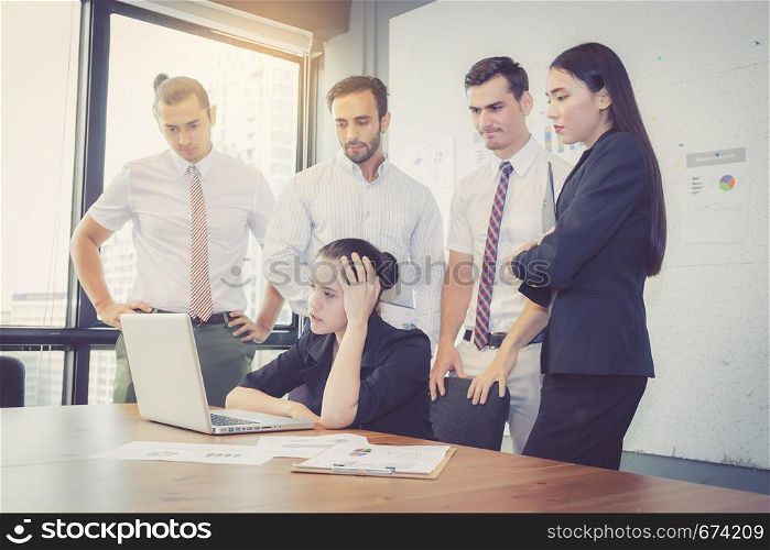 Business group meeting teamwork of unhappy and stress with problem fail, team serious at office with deadline work of employee.