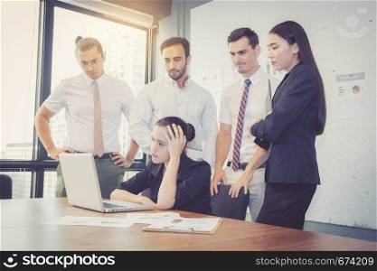 Business group meeting teamwork of unhappy and stress with problem fail, team serious at office with deadline work of employee.