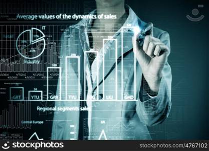 Business growth. Chest view of businesswoman drawing with pencil increasing graph