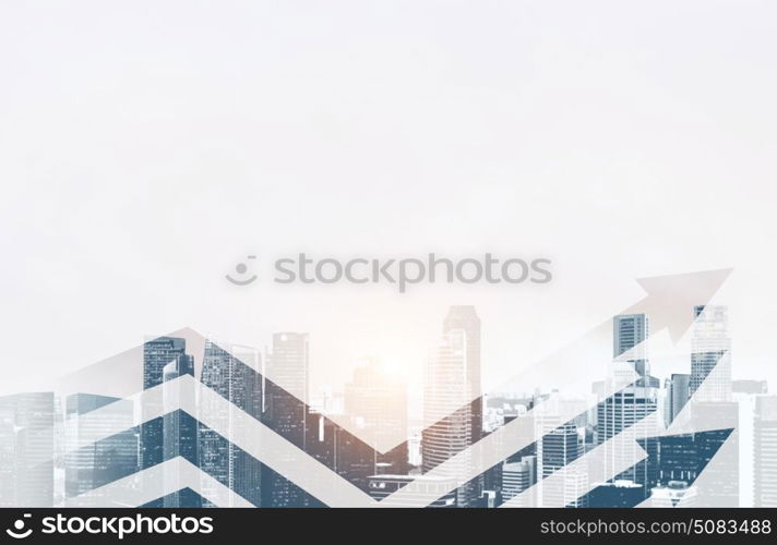 Business growth concept. Business growth chart. Arrows against blurred panoramic view of Singapore downtown and skyline at sunset in office window.