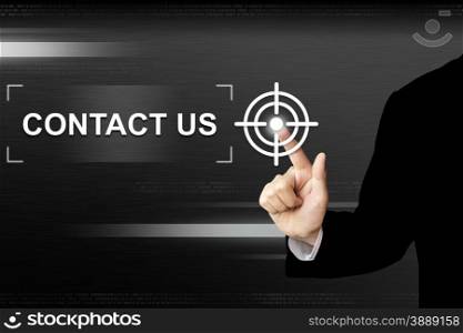 business hand clicking contact us button on a touch screen interface