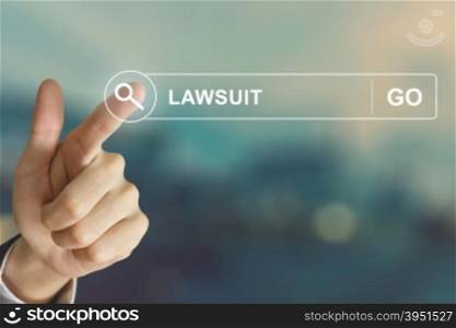 business hand clicking lawsuit button on search toolbar with vintage style effect