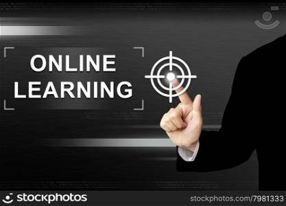 business hand clicking online learning button on a touch screen interface