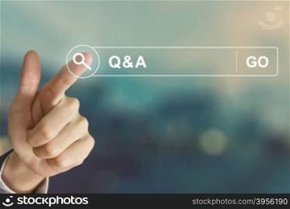 business hand clicking Q&amp;A or Question and Answer button on search toolbar with vintage style effect