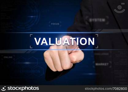 business hand clicking valuation button on virtual screen