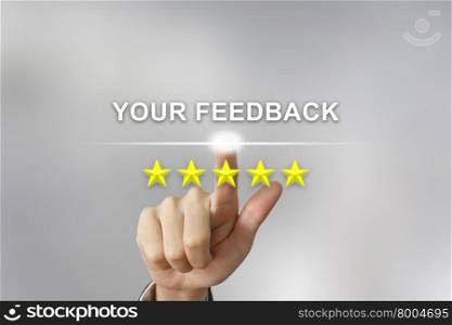 business hand clicking your feedback with five stars on screen