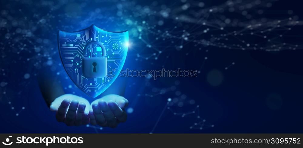 Business Hand holding Shield with Padlock icon and Network wireframe over blue background abstract. Cyber attack block, Cyber data, and Information privacy Concept.