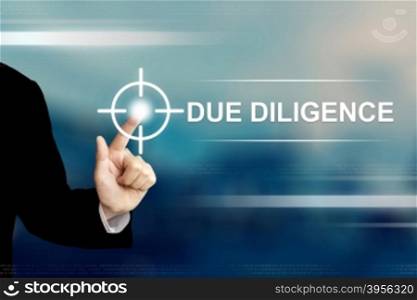 business hand pushing due diligence button on a touch screen interface
