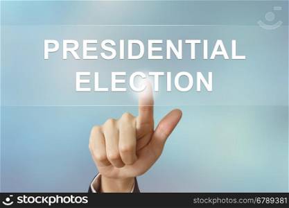 business hand pushing presidential election button on blurred background