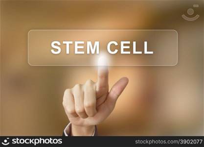 business hand pushing stem cell button on blurred background