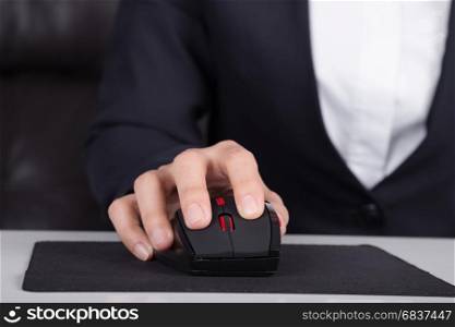 business hand working with mouse of computer