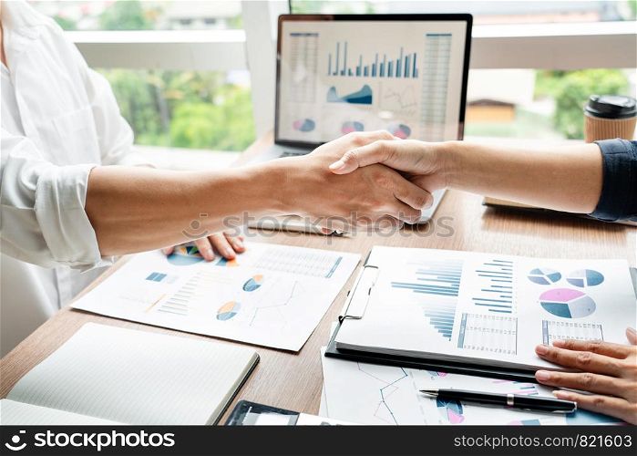 Business handshake after agreement meeting or negotiation finishing up dealing project, partnership approval and deal concept