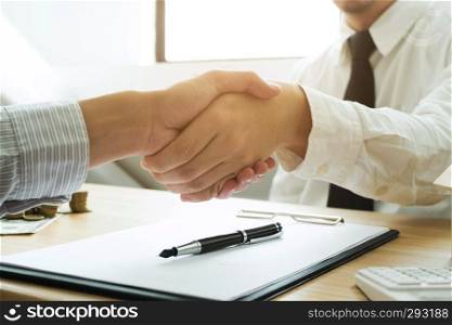 Business handshake. Business people shaking hands, finishing up a meeting,Success agreement negotiation.Business concept.