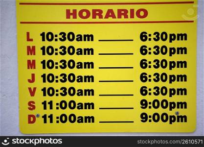 Business hours schedule sign, Spanish