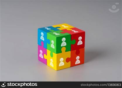 Business & HR icon on colorful jigsaw puzzle cube
