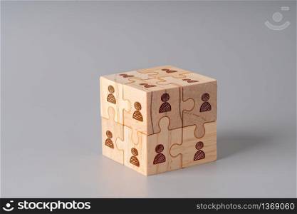 Business & HR icon on wood jigsaw puzzle cube