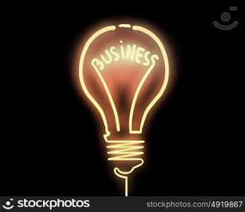 Business idea. Light bulb with concepts inside on dark background