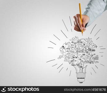 Business ideas. Close up of businessman hand drawing business strategy sketches