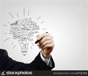 Business ideas. Close up of businessman hand drawing business strategy sketches