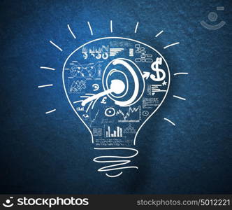 Business ideas. Conceptual image of light bulb and business strategy sketch