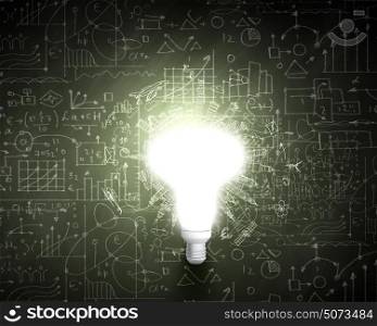 Business ideas. Conceptual image with light bulb diagrams and graphs
