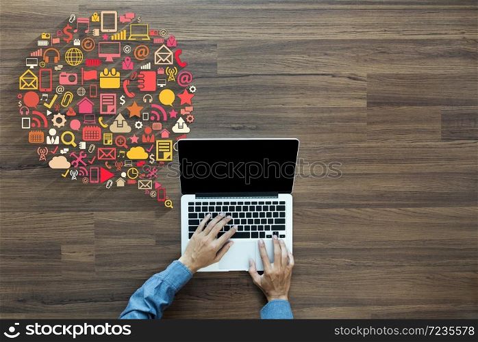 Business innovation technology set application icons, With businessman working on laptop computer PC on wood table, view from above