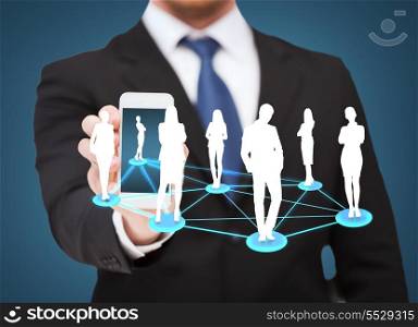 business, internet and technology concept - businessman showing smartphone with social network on screen