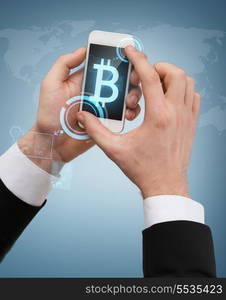 business, internet and technology concept - businessman touching screen of smartphone with bitcoin sign on screen