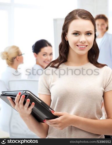 business, internet and technology concept - businesswoman with tablet pc in office