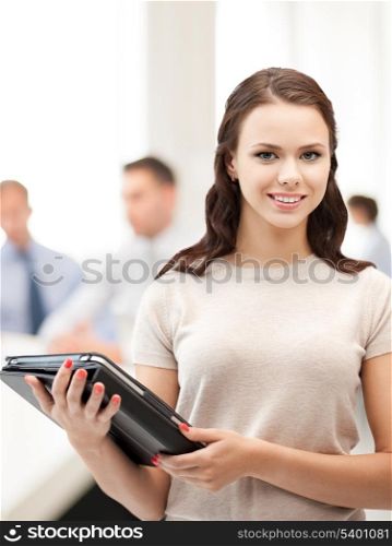 business, internet and technology concept - businesswoman with tablet pc in office