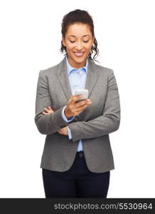 business, internet and technology concept - smiling african-american woman looking at smartphone