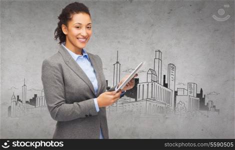business, internet and technology concept - smiling african-american woman looking at tablet pc computer with city drawing in the back