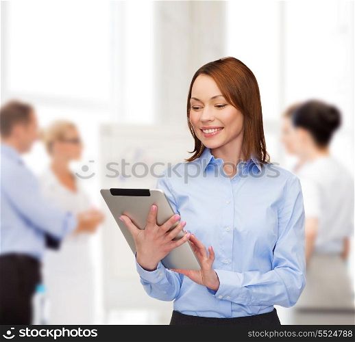 business, internet and technology concept - smiling woman looking at tablet pc computer at office
