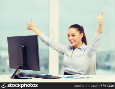 business, internet, office and technology concept - smiling businesswoman with computer and paper showing thumbs up