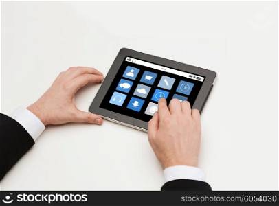 business, internet, people and technology concept - close up of man hands working with with application icons tablet pc computer screen