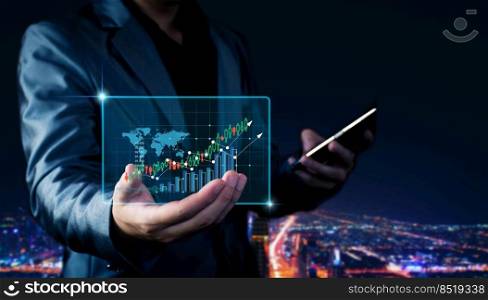 Business is growing. Businessman showing a graph of rising stocks. Shown in hand by holograms, startup, set business success goals, economic recovery, future technology, stock trading, online trading.