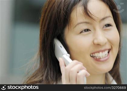 Business lady who speaks with the cell phone