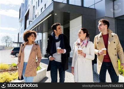 business, lifestyle and corporate concept - international group of people or friends with coffee on city street. group of people or friends with coffee in city